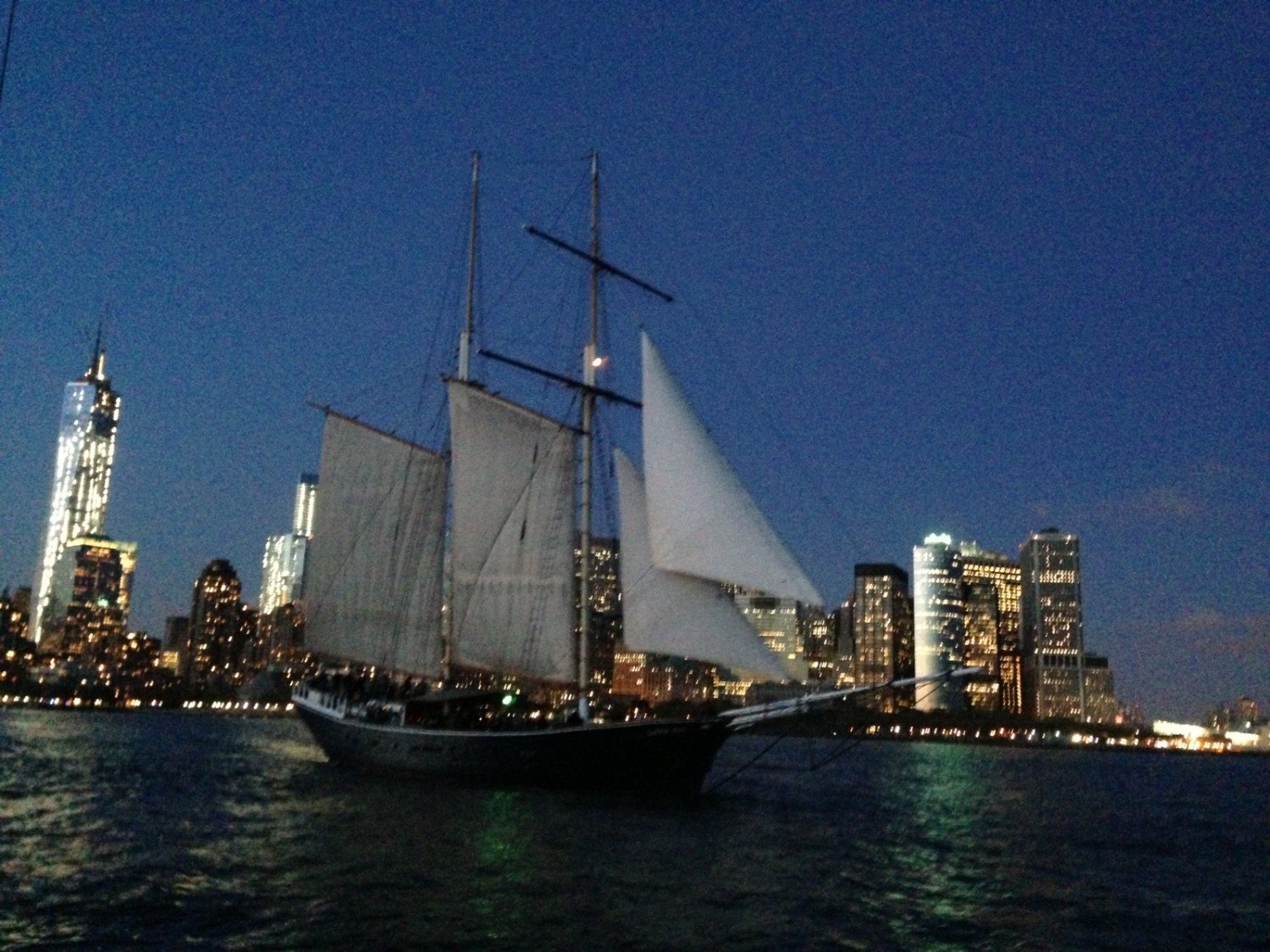 See Manhattan By Night From the Clipper City Tall Ship